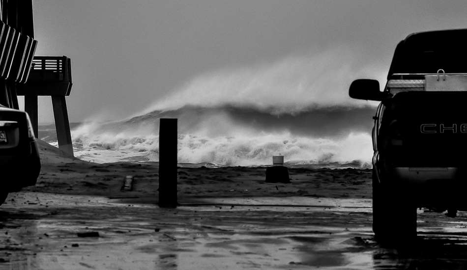 Hurricane Sandy changed everything. She was tough to shoot because the weather was so bad. After the wind went offshore, I took captured this monster at Jennette\'s Pier in Nags Head. For a little perspective, the end of the pier shown is over 1000\' from the car in the foreground and the pier deck is 25\' from sea level. At the peak of the storm and high tide, I shot a handful of waves breaking over the railing at the end of the pier.